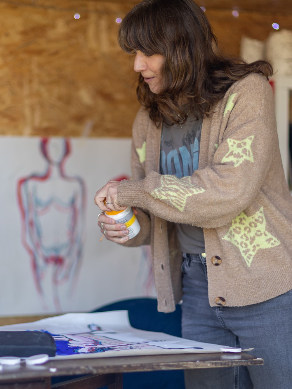 A photo of Sara Truckel in her art studio